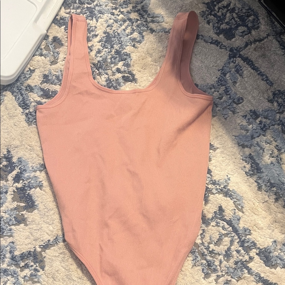 Pink bodysuit